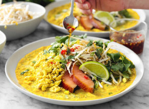 8-crepes-vietnamiennes-banhxeo-tofu-brouille-saumon-HR-beautyshot-plat-scaled-e1775140431734 (1)